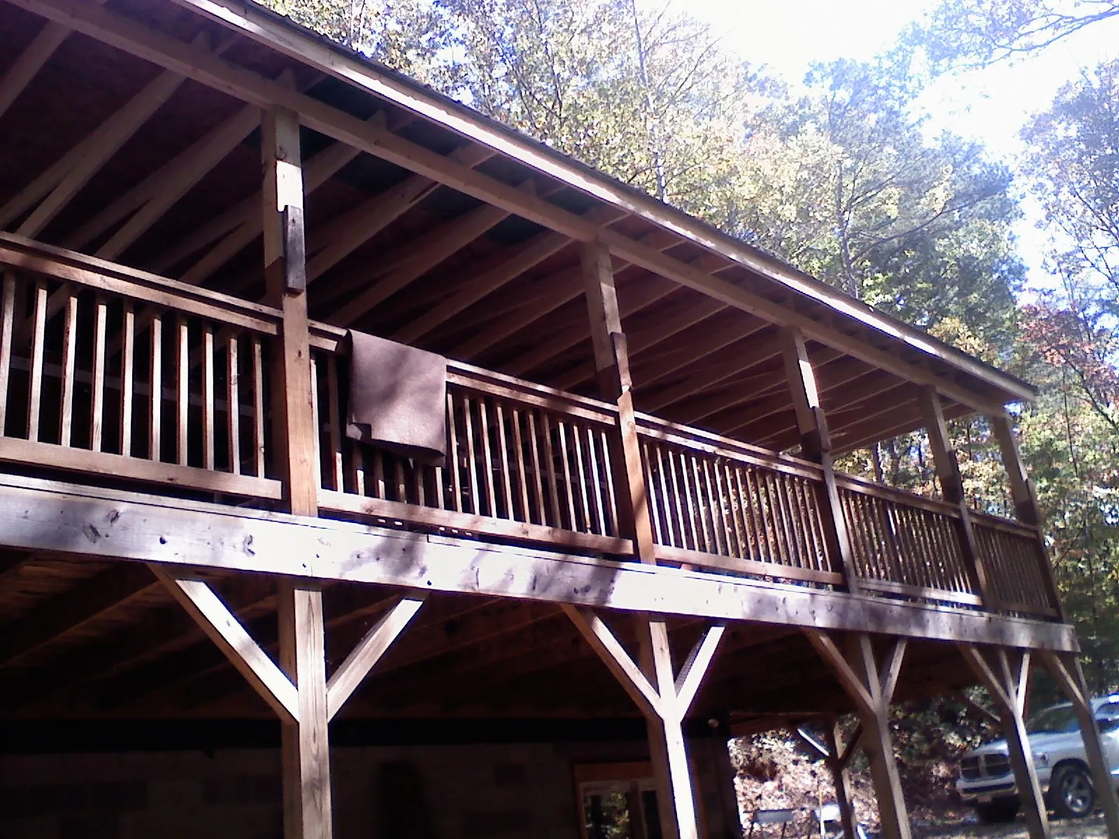 Timber framing under a new elevated porch and deck — Roof Leak Repair in Essex Junction by Roofing Brothers